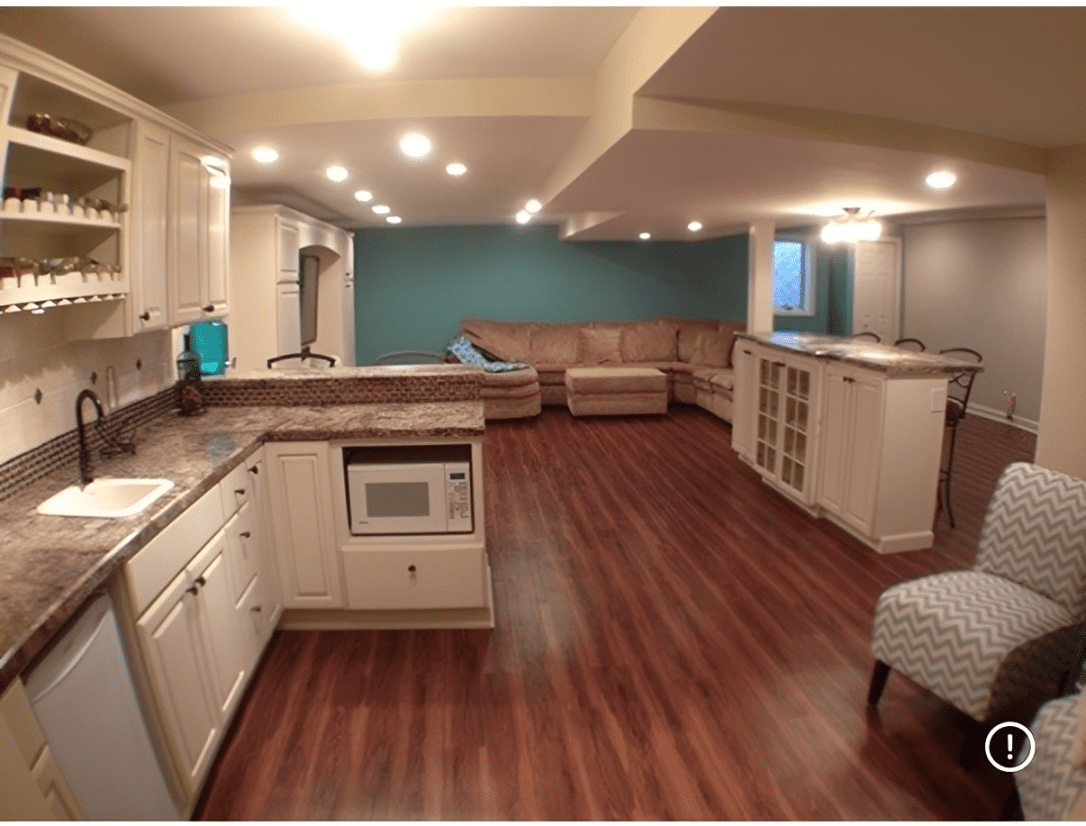 Spacious basement kitchen and living area.