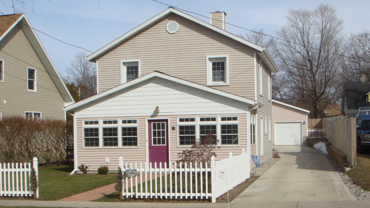 Two-story house with purple door