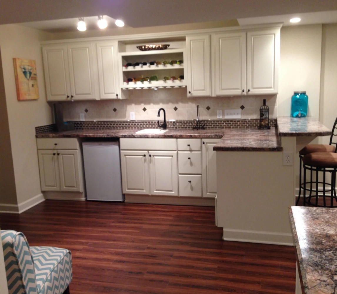 Stylish kitchen with white cabinets