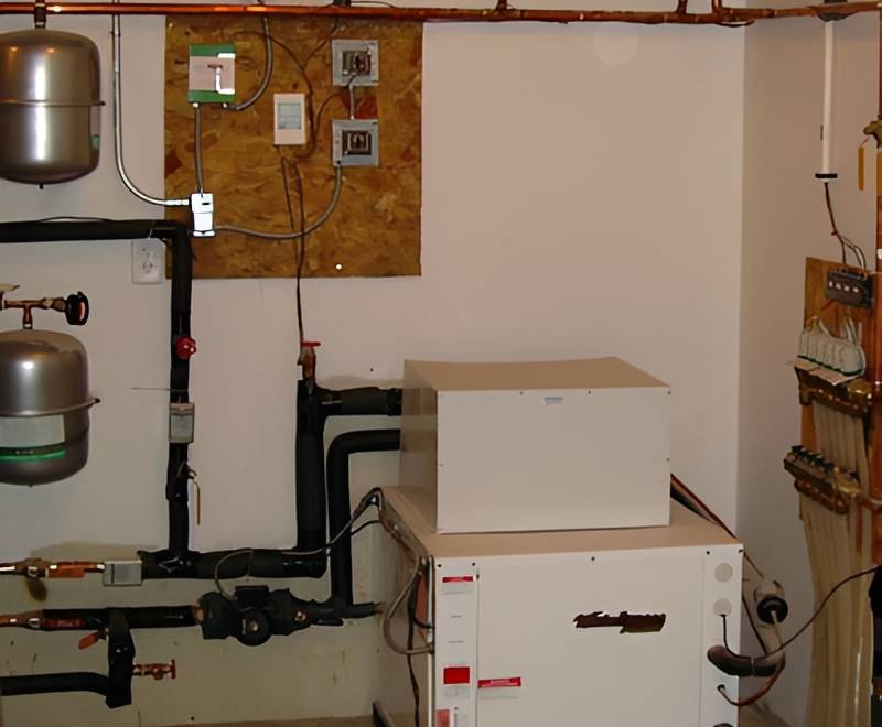 Boiler room with heating system equipment.
